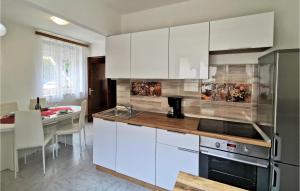 Amazing Apartment In Novi Vinodolski With 4 Bedrooms, Wifi And Outdoor Swimming Pool