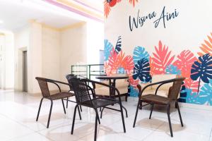 Wisma Aini Syariah Mitra RedDoorz