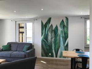 Appartements Un petit bout de reve, balcon, parking & proche centre : photos des chambres