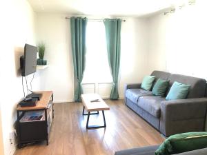 Appartements Un petit bout de reve, balcon, parking & proche centre : photos des chambres