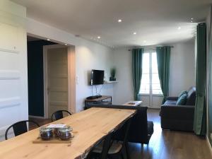 Appartements Un petit bout de reve, balcon, parking & proche centre : photos des chambres