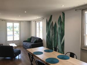 Appartements Un petit bout de reve, balcon, parking & proche centre : photos des chambres