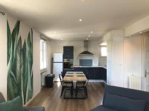 Appartements Un petit bout de reve, balcon, parking & proche centre : photos des chambres