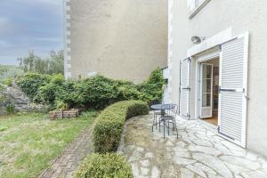 Appartements Le Morphee - Appartement moderne avec jardin : photos des chambres