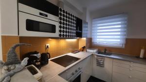 DISZTINGVÁLT Apartman, free garage