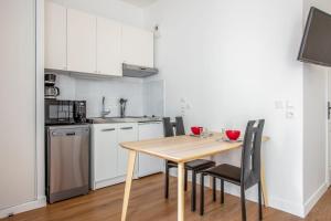 Appartements Wonderful studio with terrace - Saint-Denis - Welkeys : photos des chambres