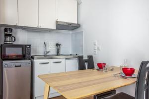 Appartements Wonderful studio with terrace - Saint-Denis - Welkeys : photos des chambres