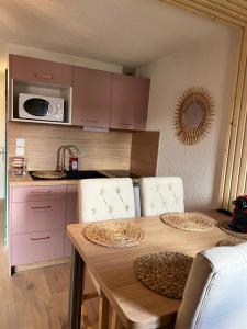 Appartements Studio cocooning style naturel : photos des chambres