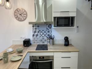 Appartements L ATELIER cour clim 3 ETOILES : photos des chambres