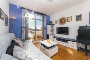 Two-Bedroom Apartment with Balcony and Sea View room in Apartments with a parking space Makarska - 15375