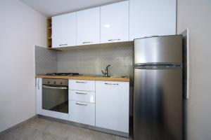 Apartments with a parking space Kastel Sucurac, Kastela - 15430