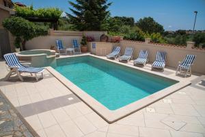 Family friendly apartments with a swimming pool Vinkuran, Pula - 15736