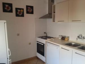 Apartments with a parking space Senj - 16008