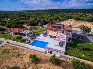Seaside luxury villa with a swimming pool Cove Mihovilje, Pag - 16124 