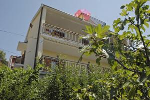 Apartments with a parking space Senj - 15376 