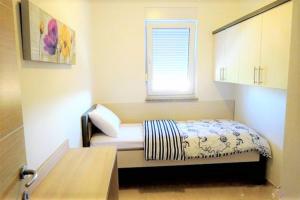 Family friendly apartments with a swimming pool Vinkuran, Pula - 15736