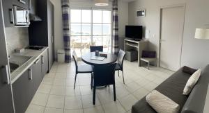 Appartements Magnifique vue mer - Tout confort : photos des chambres