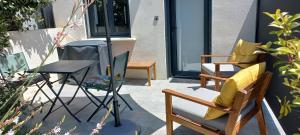 Appartements Charmant logement avec terrasse : photos des chambres