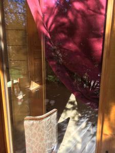 Chalets LA CACHETTE ROMANTIQUE DU Jardin : photos des chambres