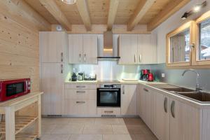 Chalets Quatre Sam - Chalet - BO Immobilier : photos des chambres