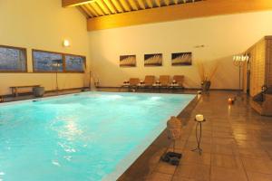 Appartements sport d'hiver, piscine et sauna : photos des chambres