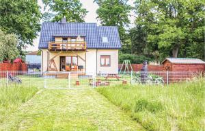 Awesome home in Nowe Warpno with 4 Bedrooms and WiFi