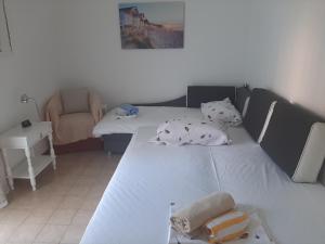 Holiday apartments Palit, Rab - 20000