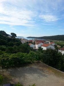 Apartments with parking space Kampor, Rab - 17034