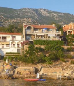 Apartments by the sea Prizna, Senj - 17309 