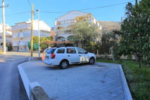 Apartments with a parking space Podstrana Split 17053