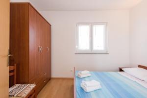 Apartments by the sea Petrcane, Zadar - 17342