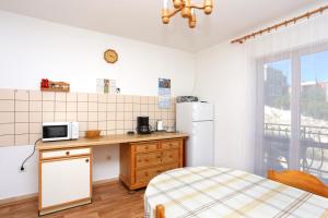 Apartments by the sea Arbanija, Ciovo - 17332