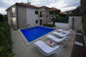 Seaside family friendly house with a swimming pool Trogir - 17358