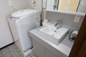 TOMMY CONDOMINIUM WAKASA 202