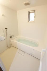 TOMMY CONDOMINIUM WAKASA 202