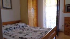 Apartments with parking space Vir - 17069