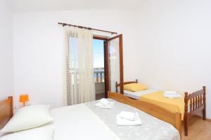 Apartments by the sea Cove Ostricka luka, Rogoznica - 17086