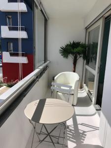 Appartements soleil et bateau : photos des chambres