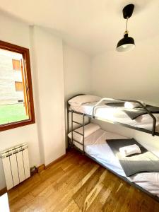 ACOGEDOR PISO EN SORT CON PISCINA