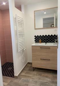 Appartements Ravissant logement avec jacuzzi : photos des chambres