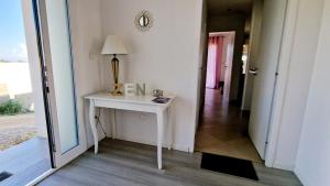 Appartements Rez de villa tout confort avec piscine : photos des chambres