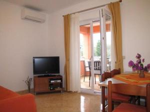 Two-Bedroom Apartment with Terrace and Sea View room in Family friendly apartments with a swimming pool Nevidjane Pasman - 18054