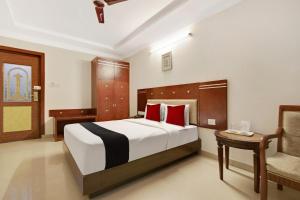 Capital O Elegant Amethyst Business Hotel Near Ragigudda Sri Prasanna Anjaneyaswamy Temple