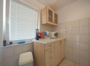 Apartments by the sea Vir - 18140