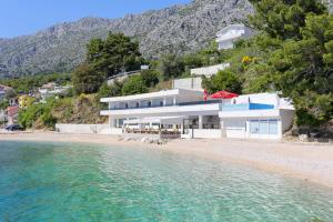 Family friendly apartments with a swimming pool Zivogosce - Porat, Makarska - 18150