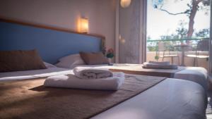 Hotels Hotel Club Oustal Del Mar : photos des chambres