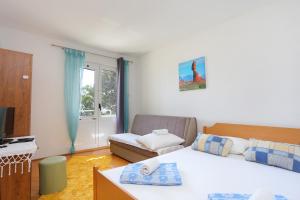 Apartments by the sea Zivogosce - Porat, Makarska - 18218