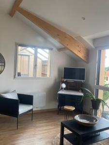 Loft avec terrasse pour 4 pers à 3km du circuit avec garage au calme