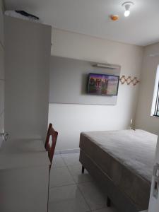 Aconchegante apartamento com churrasqueira em Bombinhas