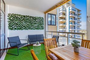 Bright 1BDR Apartment WBalcony & Pool by LovelyStay